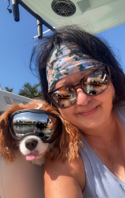 Sonia Dufour (Sony D) and her dog Finn on the water